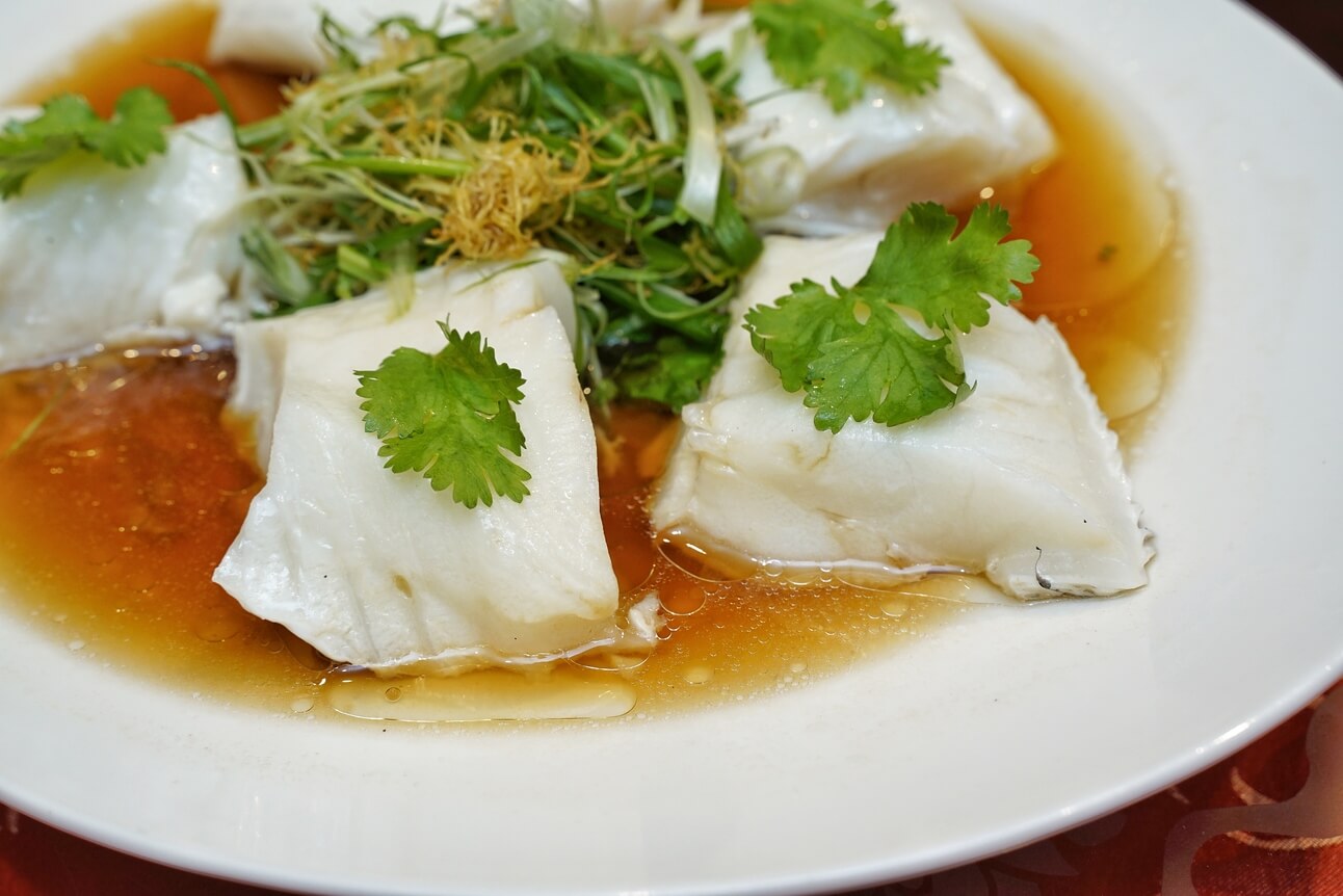 Steamed Cod Fish with Superior Soy Sauce topped with Crispy Garlic