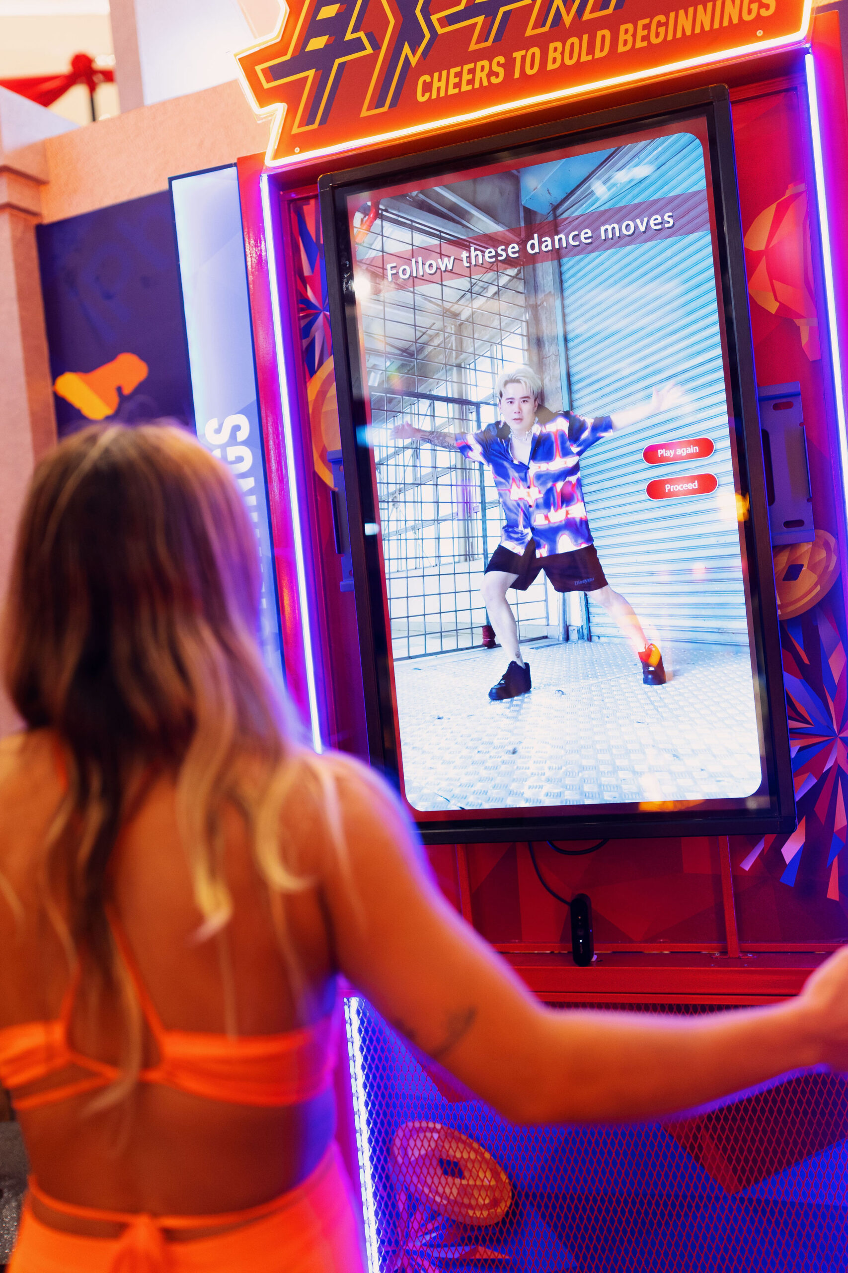 Guest attempting the interactive activities at the concourse area of Tropicana Gardens Mall during the media launch of Tiger CNY 2023 Campaign, Cheers to Bold Beginnings